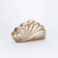 Detailed view of the elegant marble acrylic clutch bag with unique shell design. - Coffee