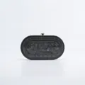 Black and white marble acrylic evening clutch detail showing unique oval striped pattern. - Black