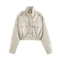 Stylish women's beige faux leather cropped jacket with stand collar and pockets. - XS / Tops / Milky White
