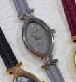 Stylish women's quartz watch with elegant oval dial and comfortable leather strap for daily wear. - Silver Case Grey Dial Grey Strap