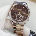 Detailed view of men's stainless steel chronograph watch with brown dial and metal bracelet. - Silver Case Black Dial Men