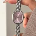 Silberne ovale Damen-Armbanduhr im Retro-Stil mit rosa Zifferblatt und feinen Details. - Silbernes Gehäuse Rosa Zifferblatt