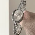 Silberne Damen Ovale Uhr im Vintage Stil mit romischen Ziffern und Metallgliederarmband. - Silbernes Gehäuse Graues Zifferblatt