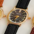 MICAI women's vintage oval quartz watch with black textured leather strap and gold case. - Black