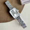 Orologio rettangolare argentato da donna con cinturino in acciaio e quadrante con numeri romani. - Cassa Argento Quadrante Bianco