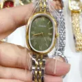 Montre quartz ovale élégante pour femme SUNLIFEX cadran vert chiffres romains bracelet acier. - Cadran Vert Bicolore