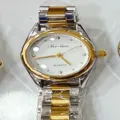 Montre quartz femme Heiheipi, style vintage, bracelet metal bicolore et cadran blanc chic. - Bicolore Cadran Blanc