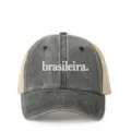 Close-up of the front embroidery detail on the vintage washed trucker hat with breathable mesh. - Adjustable / Black