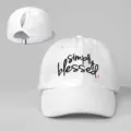 White ponytail baseball cap with embroidered simply blessed text and adjustable strap. - Adjustable / White