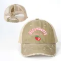 Distressed khaki mesh ponytail baseball cap with sweet strawberry embroidery and back slot. - Adjustable / Khaki
