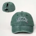 Distressed green ponytail baseball cap with simply blessed embroidery and adjustable back strap detail. - Adjustable / Dark Green