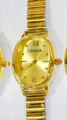 Reloj de cuarzo ovalado dorado para mujer con correa elástica de acero inoxidable. - Caja Dorada Esfera Dorada