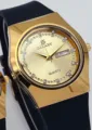 Reloj de cuarzo dorado con correa de silicona negra, índices de estrás y calendario. - Esfera Dorada Correa Negra Hombres