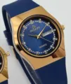 Reloj de cuarzo GALAXY con pedrería, correa de silicona azul, caja dorada y doble calendario. - Esfera Azul Correa Azul Hombre
