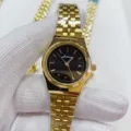 Gold stainless steel quartz watch with black dial and calendar display for daily wear. - All Gold Black Dial Women
