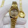 Golden stainless steel quartz watch with calendar display, elegant minimalist design for women. - All Gold Gray Dial Women