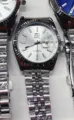 Reloj de cuarzo plateado OMYA para hombre y mujer con fechador y pulsera de metal elegante. - Caja Plateada Esfera Blanca Mujer