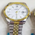 Montre quartz bicolore pour homme avec lunette cannelée et index de luxe étincelants. - Bicolore Cadran Blanc Homme