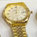 Πολυτελές χρυσό ανδρικό ρολόι quartz με ρωμαϊκούς αριθμούς, παράθυρο ημερομηνίας και μπρασελέ. - Όλα Χρυσό Χρυσό Καντράν Άνδρες