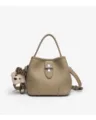 Minimalist leather bucket bag with top handle, crossbody strap and cute bear charm. - Cream