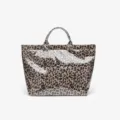 Leopard print transparent waterproof tote bag surface texture detail and handle design. - Coffee Leopard