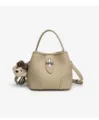 Beige leather bucket bag with top handle, metal turn-lock closure and cute bear pendant. - Khaki