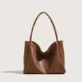 Brown leather shoulder tote bag detail view, soft slouchy design, large capacity for daily use. - Brown