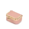 Close-up detail shot of the mini pink kiss-lock clasp jewelry and coin purse storage. - 6.5x5x3.5cm / Pink