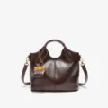 Elegant brown leather tote bag with stylish charm, versatile shoulder and crossbody design. - 24CM*11CM*20CM / Coffee