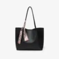 Black leather tote bag with stylish scarf, large capacity commuting shoulder bag for women. - Black