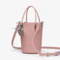 Pink mini bucket bag with top handles, detachable crossbody strap, and chic metal grape charm. - Sakura Pink