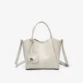 Chic minimalist faux leather women handbag casual crossbody bag with cute elephant charm - Off White