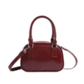 Glossy dark red mini bowling bag, stylish top-handle handbag and chic crossbody purse for women. - Red