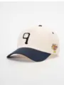 Stylische Baseballcap mit gesticktem Frontbuchstaben q und seitlichem Grafikprint. - Verstellbar / Creme/Marineblau