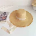 Summer hollow out raffia straw hat for women, elegant wide brim sun protection beach sunhat. - Drawstring Dome Straw Hat