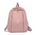 Sac à dos unicolore de grande capacité pour les déplacements quotidiens et les voyages. - Rose