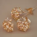 Goldener künstlicher Blumenzweig für Heimdekoration, schönes Ornament für Neujahrsfeier. - Künstliche Hortensie