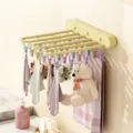Wall-mounted foldable drying rack with multi clips, yellow space-saving sock hanger. - Cheese Yellow