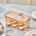 Clear brown multi-grid seasoning box kitchen condiment jar with spoons and moisture-proof lid. - 3-Grid Seasoning Box / Orange
