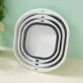 Portable collapsible silicone wash basin, nested foldable laundry tub for home and dorm use. - Gray