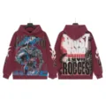 Detailed view of vintage washed streetwear hoodie featuring front cyborg graphic and back text. - S / Tops / G6603 Washed Burgundy