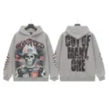Vintage washed streetwear hoodie featuring bold skull graphic and cool letter print for unisex daily wear. - S / Tops / G6601 Washed Grey