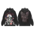 Vintage washed black streetwear hoodie showing detailed front skull graphic and back text. - S / Tops / G6601 Washed Black