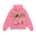 Pink Y2K aesthetic zip-up hoodie with vintage graphic print and distressed details streetwear. - Pink