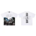 Close-up of white graphic tee featuring rhinestone ME letters and vintage diver chest print. - 13