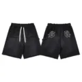 Black washed distressed streetwear shorts with gothic embroidery and elastic drawstring waist. - S / Black