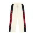 Unisex high street fashion color-blocked sweatpants with red embroidered logo details. - S / Apricot