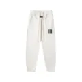 Pantalon de survêtement streetwear blanc avec cordon ajustable et coupe très moderne. - S / Bas / Blanc