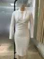 White long sleeve bandage dress with deep V neck and elegant fitted silhouette for evening party. - XS / Dresses / New White (Stitched Neckline)