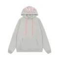 Felpa con cappuccio streetwear grigia per uomo e donna con dettagli e graffiti rosa. - Taglia S / Top / Grigio